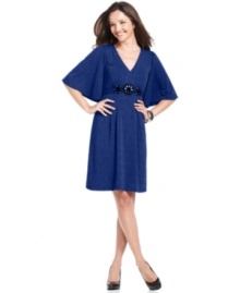 ECI elevates this dress with dolman sleeves and a sweetly beaded waistline.