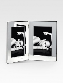 From the Fidelio Collection. Mirrored silvertone frame is designed with two apertures. A stunning display piece for a pair of treasured photographs. Wood back 4 X 6 Made in France From the Fidelio Collection. Mirrored silvertone frame is designed with two apertures. A stunning display piece for a pair of treasured photographs. Wood back 4 X 6 Made in France