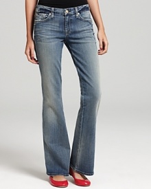 Heavy fading lends a vintage feel to these 7 For All Mankind bootcut jeans, featuring the brand's signature A stitching on the back pockets. Heavy fading lends a vintage feel to these 7 For All Mankind bootcut jeans, featuring the brand's signature A stitching on the back pockets.