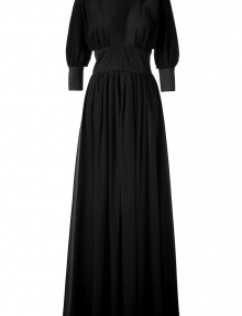 Luxurious evening gown in fine black silk - A floor length dream gown for all festive occasions - Beautiful cut with flowing, softly falling silhouette - Deep V-neck d?collet?, balloon sleeves with wide cuffs and a feminine empire waist - The skirt jumps up loosely in small folds, in a stylish to the floor length - Looks glamorous and graceful - Modern, yet timeless, you can wear this elegant gown for years and years