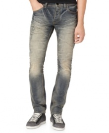 A white fade and distressed details give these Calvin Klein jeans a cool edgy style. A white fade and distressed details give these Calvin Klein jeans a cool edgy style.