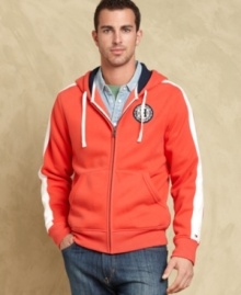 Casual goes colorful and bold with this hoodie from Tommy Hilfiger. Casual goes colorful and bold with this hoodie from Tommy Hilfiger.