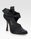 An asymmetrical bow defines this satin design with semi-sheer mesh and daring cutouts. Self-covered heel, 4½ (115mm)Satin and mesh upperSide zipLeather lining and solePadded insoleMade in Italy