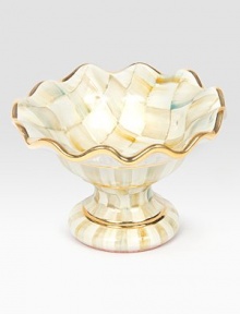 This one-of-a-kind centerpiece, crafted in lustrous, hand-painted terra cotta with color-dragged checks and golden trim, creates an understated and elegant presentation for your meal.Ceramic with golden lustre5.75 diam.4 tallHand washMade in the USA This one-of-a-kind centerpiece, crafted in lustrous, hand-painted terra cotta with color-dragged checks and golden trim, creates an understated and elegant presentation for your meal.Ceramic with golden lustre5.75 diam.4 tallHand washMade in the USA