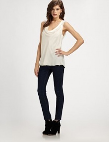 Elegant silk cowlneck with ribbed trim and a silhouette that hits below the hips. CowlneckSleevelessRibbed trimLonger length hits below the hipsSilkDry cleanImported Elegant silk cowlneck with ribbed trim and a silhouette that hits below the hips. CowlneckSleevelessRibbed trimLonger length hits below the hipsSilkDry cleanImported