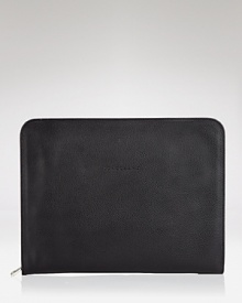 Upgrade your on-the-go essentials with this sleeve from Longchamp. Crafted from luxurious leather, it's a simple style that plays off the label's practical-chic. Upgrade your on-the-go essentials with this sleeve from Longchamp. Crafted from luxurious leather, it's a simple style that plays off the label's practical-chic.