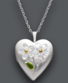 The perfect place for your tiniest keepsakes. This pretty pendant features a working locket design with engraved and painted floral details. Crafted from Mother of Pearl (8 mm) set in sterling silver with 14k gold accents. Approximate length: 18 inches. Approximate drop: 1 inch. The perfect place for your tiniest keepsakes. This pretty pendant features a working locket design with engraved and painted floral details. Crafted from Mother of Pearl (8 mm) set in sterling silver with 14k gold accents. Approximate length: 18 inches. Approximate drop: 1 inch.