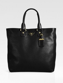 Pebbled calfskin leather crafted in roomy silhouette that can be worn over the shoulder.Double top handles, 7 drop Removable adjustable shoulder strap, 15-16 drop Top snap closure One inside zip pocket One inside open pocket Signature jacquard lining 16W X 14H X 6½D Made in Italy Pebbled calfskin leather crafted in roomy silhouette that can be worn over the shoulder.Double top handles, 7 drop Removable adjustable shoulder strap, 15-16 drop Top snap closure One inside zip pocket One inside open pocket Signature jacquard lining 16W X 14H X 6½D Made in Italy
