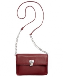 Carry off this season's chicest silhouette with this irresistible crossbody from Calvin Klein. Outfitted with signature hardware and ladylike chain-link details, it's perfectly sized for all your day-to-night essentials. Carry off this season's chicest silhouette with this irresistible crossbody from Calvin Klein. Outfitted with signature hardware and ladylike chain-link details, it's perfectly sized for all your day-to-night essentials.