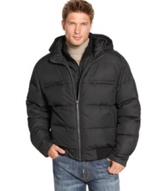 Keep warm this season without sacrificing style in this classic down jacket complete with a zip-off hood from Hawke & Co.