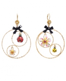 Get down with your inner flower child in Betsey Johnson's flirty gypsy hoop earrings. Each delicate hoop features a colorful ladybug and a petite flower charm. Crafted in gold-plated mixed metal with yellow, pink, white, and black enamel accents and tiny black ribbons. Approximate drop: 3 inches.