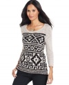 Style&co. makes the tribal trend totally wearable with this boldly patterned petite sweater, rendered in neutral, go-with-everything colors.