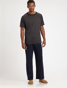 Comfort without equal for the nights and weekends you need it most, cut with a relaxed fit in exceedingly soft cotton. Drawstring waistSide slash pocketsInseam, about 31CottonMachine washImported Comfort without equal for the nights and weekends you need it most, cut with a relaxed fit in exceedingly soft cotton. Drawstring waistSide slash pocketsInseam, about 31CottonMachine washImported