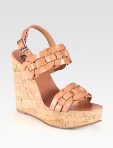 Rich leather style with an adjustable slingback, a natural cork wedge and braided leather straps. Cork wedge, 5 (125mm)Covered platform, 1½ (40mm)Compares to a 3½ heel (90mm)Leather upperLeather liningRubber soleImportedOUR FIT MODEL RECOMMENDS ordering one half size up as this style runs small. 