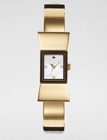 A sweet design with a goldtone case and bangle. Quartz movementWater resistant to 3 ATMBow-shaped goldtone case, 15mm (0.6)Smooth bezelMother-of-pearl dialThree crystal hour markersSecond hand Goldtone bangleImported A sweet design with a goldtone case and bangle. Quartz movementWater resistant to 3 ATMBow-shaped goldtone case, 15mm (0.6)Smooth bezelMother-of-pearl dialThree crystal hour markersSecond hand Goldtone bangleImported