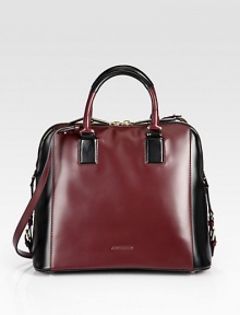 An elegant colorblocked leather style with a convenient shoulder strap.Double top handles, 5 dropShoulder strap, 19 dropTop zip closureThree inside open pocketsLeather lining13½W X 11H X 7¼DMade in Italy