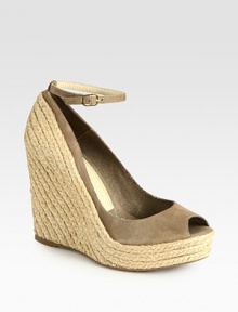 Elaborate espadrille wedge complemented by a soft suede upper and an adjustable ankle strap. Hemp wedge, 4½ (115mm)Hemp platform, 1 (25mm)Compares to a 3½ heel (90mm)Suede upperLinen liningRubber solePadded insoleImportedOUR FIT MODEL RECOMMENDS ordering one half size up as this style runs small. Elaborate espadrille wedge complemented by a soft suede upper and an adjustable ankle strap. Hemp wedge, 4½ (115mm)Hemp platform, 1 (25mm)Compares to a 3½ heel (90mm)Suede upperLinen liningRubber solePadded insoleImportedOUR FIT MODEL RECOMMENDS ordering one half size up as this style runs small.