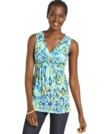 Punctuate your wardrobe with this printed V-neck top from Cha Cha Vente! The twisted detail at the front is a fun extra, too!