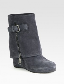 Suede wedge ankle boot with a foldover shaft and side zip closure. Self-covered wedge, 4 (100mm)Covered platform, ½ (15mm)Compares to a 3½ heel (90mm)Suede upperExposed side zip and adjustable strapLeather liningRubber trek solePadded insoleImported