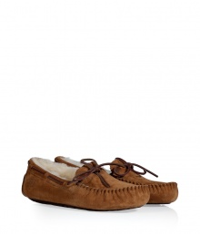 Finish your casual look on a comfy note with UGG Australias shearling lined suede moccasins - Round toe, natural leather sash, cream shearling lining, rubber sole - Perfect for cozy days both indoors and out - Wear with everything from flannel pajamas to oversized knits and favorite skinnies