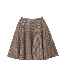 For a modern riff on classic equestrian chic, try McQ Alexander McQueens elegant cotton and wool blend swing skirt - In a traditional brown houndstooth pattern - Gently pleated, A-line cut hits above the knee and bells at hem - Slim waistband and back zip - Pair with a classic white button down or cardigan and platform pumps or ankle booties For a modern riff on classic equestrian chic, try McQ Alexander McQueens elegant cotton and wool blend swing skirt - In a traditional brown houndstooth pattern - Gently pleated, A-line cut hits above the knee and bells at hem - Slim waistband and back zip - Pair with a classic white button down or cardigan and platform pumps or ankle booties