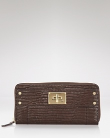 Opt to stash your cash in something exotic with this Iguana-embossed leather wallet from Milly. It has ample pockets for the essentials, proving practical accessories don't have to be plain. Opt to stash your cash in something exotic with this Iguana-embossed leather wallet from Milly. It has ample pockets for the essentials, proving practical accessories don't have to be plain.