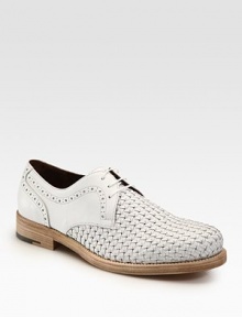 Modern update on a dress classic, stylishly woven in Italian calfskin leather.Leather upperLeather liningPadded insoleLeather soleMade in Italy Modern update on a dress classic, stylishly woven in Italian calfskin leather.Leather upperLeather liningPadded insoleLeather soleMade in Italy