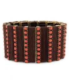 Spice up your style with this coral detailed design from Jessica Simpson. A bronze stretch design with coral bead accents. Approximate length: 8-3/4 inches. Approximate diameter: 2-1/2 inches.