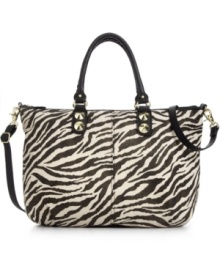 Safari is always in season. Add instant allure to you look with this zebra print design from Danielle Nicole. Polished gold-tone hardware, sturdy handles and convenient crossbody strap make this spacious silhouette the ultimate companion for any outing. Safari is always in season. Add instant allure to you look with this zebra print design from Danielle Nicole. Polished gold-tone hardware, sturdy handles and convenient crossbody strap make this spacious silhouette the ultimate companion for any outing.