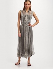 Airy silk chiffon in graphic window checks, is trimmed with ruffles for an ultra femme design.Ruffled collar Sleeveless with ruffle trim Ruffled front button placket Seamed waist Ruffled hem Contrast rayon camisole dress About 50 from shoulder to hem Silk; dry clean Made in Italy