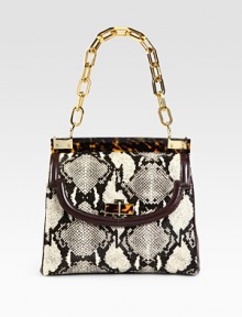An illusion of luxurious proportions, this snake printed calf hair design is trimmed in smooth leather, glossy resin and radiant hardware.Resin chain shoulder strap, 8½ dropMagnetic snap flap closureOne zip and two open inner compartmentsOne inside zip pocketTwo inside open pocketsCanvas lining11W X 8H X 5DImported An illusion of luxurious proportions, this snake printed calf hair design is trimmed in smooth leather, glossy resin and radiant hardware.Resin chain shoulder strap, 8½ dropMagnetic snap flap closureOne zip and two open inner compartmentsOne inside zip pocketTwo inside open pocketsCanvas lining11W X 8H X 5DImported
