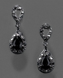Be the queen of the night. These sultry Monet earrings feature jet black crystal accents set in silvertone mixed metal. Approximate drop: 1 inch. Be the queen of the night. These sultry Monet earrings feature jet black crystal accents set in silvertone mixed metal. Approximate drop: 1 inch.
