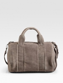 Gorgeous calfskin with a lasercut velvet finish, styled in a roomy top-handle carryall.Double top handles, 5 dropAdjustable shoulder strap, 13¼-13½ dropTop zip closureProtective metal feetOne inside zip pocketFully lined8W X 12H X 9DImported Gorgeous calfskin with a lasercut velvet finish, styled in a roomy top-handle carryall.Double top handles, 5 dropAdjustable shoulder strap, 13¼-13½ dropTop zip closureProtective metal feetOne inside zip pocketFully lined8W X 12H X 9DImported