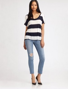 Skinny-fit stretch denim, lovingly distressed and styled in an ankle-baring crop.THE FITSkinny fitRise, about 8Inseam, about 30THE DETAILSZip flyFive-pocket style92% cotton/7% polyester/1% spandexDry cleanMade in USAModel shown is 5'11 (180cm) wearing US size 4. Skinny-fit stretch denim, lovingly distressed and styled in an ankle-baring crop.THE FITSkinny fitRise, about 8Inseam, about 30THE DETAILSZip flyFive-pocket style92% cotton/7% polyester/1% spandexDry cleanMade in USAModel shown is 5'11 (180cm) wearing US size 4.