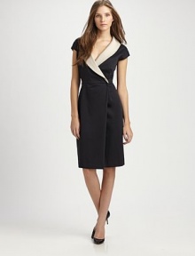 Crisp stretch cotton, tailored in an ultra-flattering wrap style with a contrasting collar.Contrasting foldover surplice necklineCap sleevesConcealed front closureAbout 25 from natural waist96% cotton/4% spandexMade in Italy of imported fabricModel shown is 5'10 (177cm) wearing US size 4. Crisp stretch cotton, tailored in an ultra-flattering wrap style with a contrasting collar.Contrasting foldover surplice necklineCap sleevesConcealed front closureAbout 25 from natural waist96% cotton/4% spandexMade in Italy of imported fabricModel shown is 5'10 (177cm) wearing US size 4.
