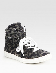 Sporty, suede high top sneaker updated by a leopard print, Velcro® strap and lace-up front. Rubber platform, 1 (25mm)Leopard-print suede upperLeather liningRubber solePadded insoleMade in PortugalOUR FIT MODEL RECOMMENDS ordering true whole size; ½ sizes should order the next whole size down. 