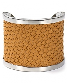 Tactile touches continue to be a major trend. Make the look day-right with this bold leather and silver tone plated cuff bracelet from MICHAEL Michael Kors. Tactile touches continue to be a major trend. Make the look day-right with this bold leather and silver tone plated cuff bracelet from MICHAEL Michael Kors.