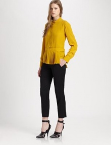 Cropped wool trousers in a relaxed silhouette with slight pleating, sateen paneling and back besom pockets. Tab closureZip flyBack besom pocketsRise, about 10Inseam, about 27WoolDry cleanImported of Italian fabricModel shown is 5'10 (177cm) wearing US size 2.