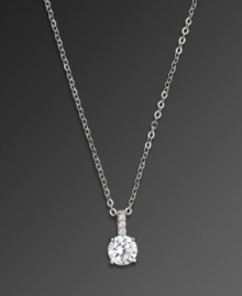 Make a statement in solitaire sparkle. CRISLU pendant features a single, round-cut cubic zirconia (1 ct. t.w.) set in platinum over sterling silver, with glittering cubic zirconia accents at the bail. Approximate length: 16 inches. Approximate drop: 7/8 inch.