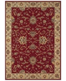 Evoking the strong look of ancient Sarouk rug designs, the Premier area rug from Dalyn is woven with intricate floral medallions in rich burgundy. Made in Egypt of durable polypropylene and shimmering polyester fibers, it provides any room with captivating texture and added dimension.