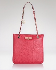 High shine hardware gives this simple and sleek convertible bag from DKNY a hit of cool. Style it over the shoulder or carry it across the body to tap this bag's versatile appeal. High shine hardware gives this simple and sleek convertible bag from DKNY a hit of cool. Style it over the shoulder or carry it across the body to tap this bag's versatile appeal.