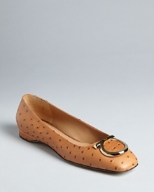 In a luxe ostrich embossed leather with distinctive logo accents, these flats are exotically Salvatore Ferragamo.