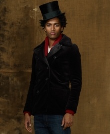 A preferred hunting topper is adapted to the city streets with a handsome double-breasted silhouette in sleek corduroy.