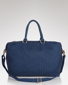 Texture and a top handle make Cornelia Guest's woven satchel trend-right. Crafted from a unique faux leather, the woven bag is a chic way to be cruelty-free. Texture and a top handle make Cornelia Guest's woven satchel trend-right. Crafted from a unique faux leather, the woven bag is a chic way to be cruelty-free.