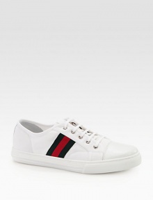 Canvas sneaker with leather trim and signature web detail.Green/red/green signature web detailRubber sole embossed with Gucci script logoMade in Italy Canvas sneaker with leather trim and signature web detail.Green/red/green signature web detailRubber sole embossed with Gucci script logoMade in Italy
