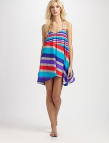 Golden trim and a soft, ruffle hem give this striped design a romantic look. V-neckSleevelessRacerbackPull-on style82% nylon/18% spandexHand washImported Golden trim and a soft, ruffle hem give this striped design a romantic look. V-neckSleevelessRacerbackPull-on style82% nylon/18% spandexHand washImported