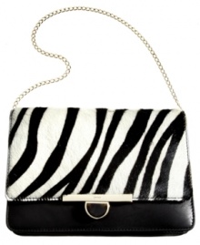 Show your stripes with this leather and haircalf clutch from DKNY that adds the exotic to your evening out. Zebra print plays elegantly alongside golden hardware and signature detailing, while the interior effortlessly stows phone, cards, cash and ID. Show your stripes with this leather and haircalf clutch from DKNY that adds the exotic to your evening out. Zebra print plays elegantly alongside golden hardware and signature detailing, while the interior effortlessly stows phone, cards, cash and ID.