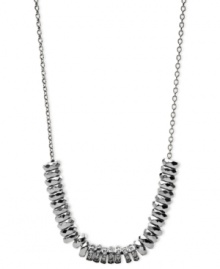 Fossil's necklace gets a something extra in the way of style. Crafted from silver-tone stainless steel, the necklace dazzles with sparkling accents and rounded beads. Approximate length: 16 inches + 2-inch extender.