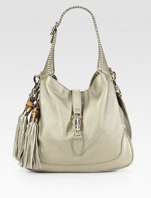 Metallic leather finished with a hand-stitched top handle and chic bamboo and leather tassels.Double top handles, 9 dropRemovable shoulder strap, 18 dropPush-lock closureOne inside zip pocketTwo inside open pocketsCotton lining13½W X 11½H X 2DMade in Italy Metallic leather finished with a hand-stitched top handle and chic bamboo and leather tassels.Double top handles, 9 dropRemovable shoulder strap, 18 dropPush-lock closureOne inside zip pocketTwo inside open pocketsCotton lining13½W X 11½H X 2DMade in Italy
