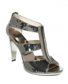 Put some shine in your step with MICHAEL Michael Kors' Berkley t-strap sandals.